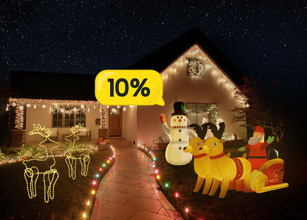 House decorated with inflatable snowmen, glowing reindeer and LED lights. Yellow discount bubble in the centre shows 10%.