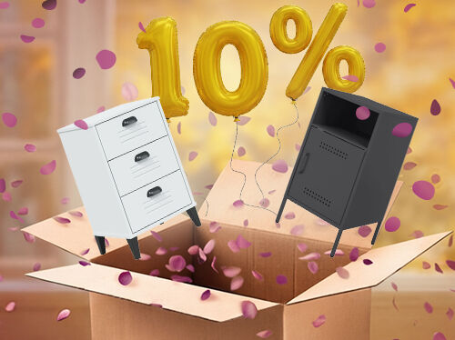 Open box with white and black bedside cabinets popping out, purple petals scattered around in an indoor setting. Yellow balloons show a 10% discount. Click to see the products in the offer.