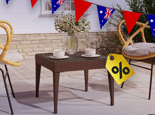 Outdoor patio set with two chairs and a table, decorated with Australian flag bunting and a yellow sale tag with a percentage sign on the table. Click to see the products in the collection.