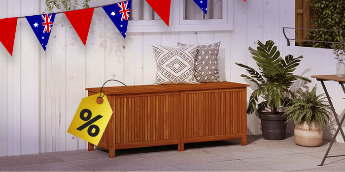 Wooden bench with patterned cushions on a patio, decorated with Australian flag buntings and a percentage discount tag hanging from the bench. Click to see the products in the collection.