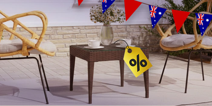 Outdoor patio set with two chairs and a table, decorated with Australian flag bunting and a yellow sale tag with a percentage sign on the table. Click to see the products in the collection.