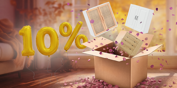 Open box with chest of drawers and sideboard popping out, purple petals scattered around in an indoor setting. Yellow balloons show a 10% discount. Click to shop the collection.